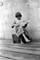 Little Girl With Cigar Box Guitar